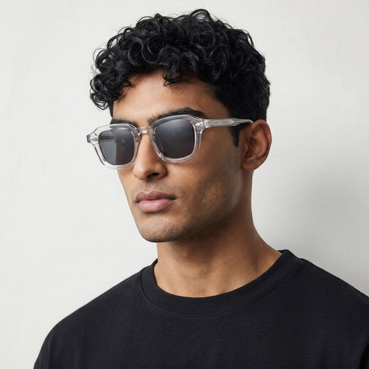nadaraty eyewear Horus Dilta H 82 clear acetate square sunglasses with black lenses.