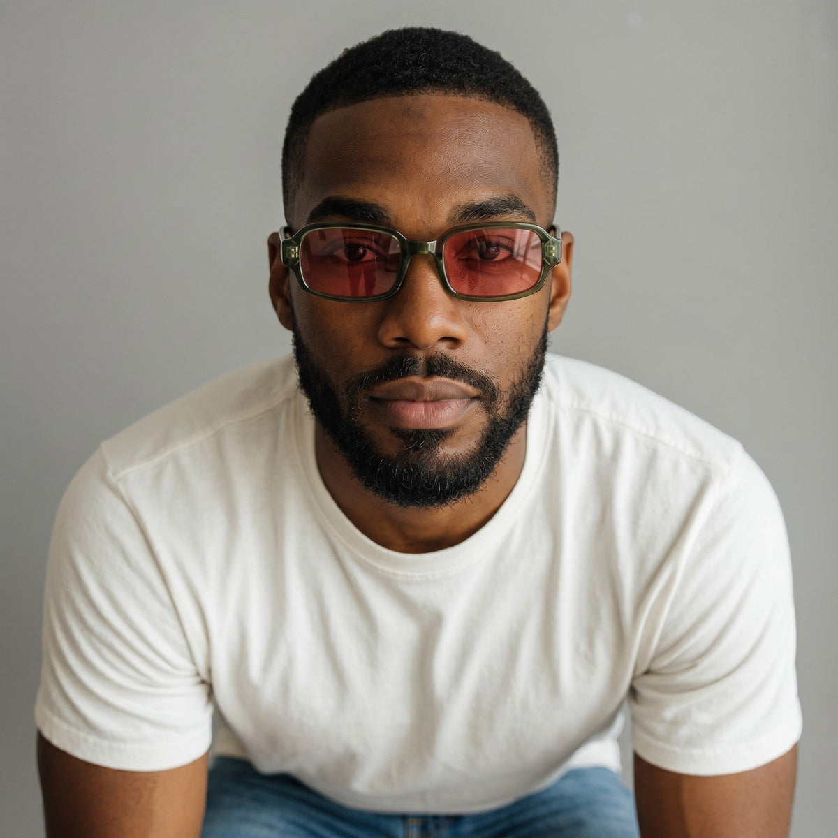 nadaraty eyewear Horus Dante h188 sunglasses with green acetate frames and red tinted lenses on a man.