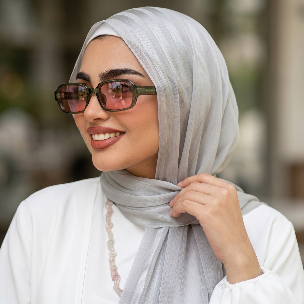 nadaraty eyewear Horus Dante h188 sunglasses with translucent green acetate frames and pink lenses.