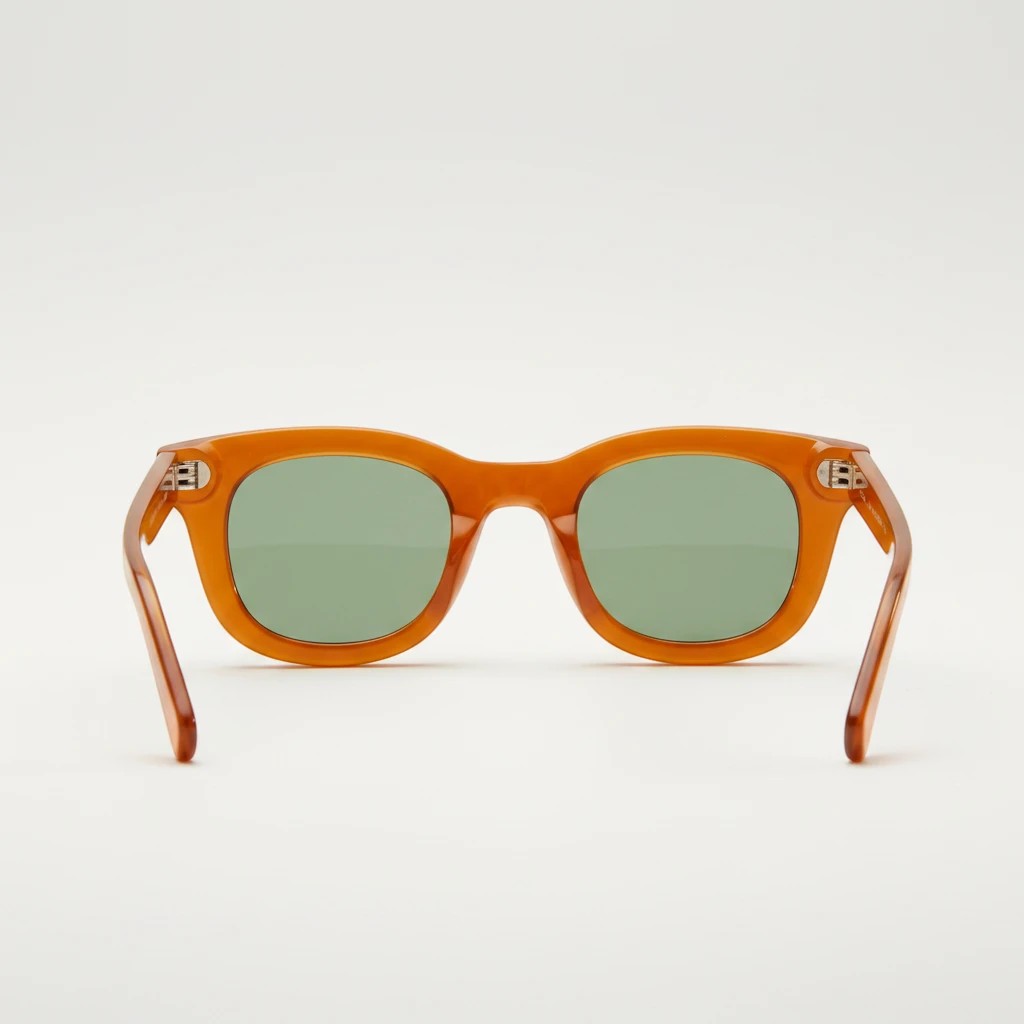 Nadaraty eyewear Horus Empire H 170 orange acetate sunglasses with green polarized lenses.