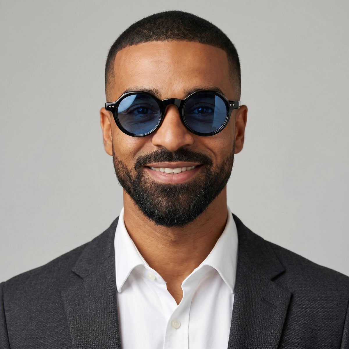 nadaraty eyewear Horus Inferno black acetate round sunglasses with bright blue polarized lenses.