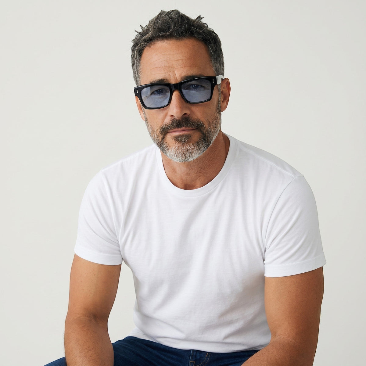 nadaraty eyewear Horus Oryx H 140 black acetate rectangular sunglasses with blue mirror lenses.