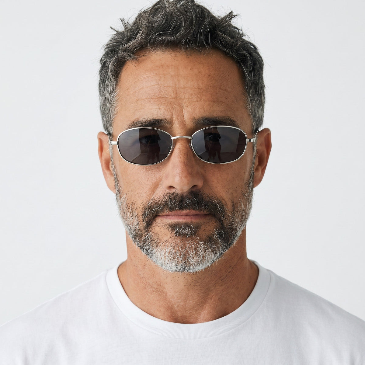 nadaraty eyewear Horus Wolf - H 191 silver oval sunglasses with dark grey lenses and black temple tips.